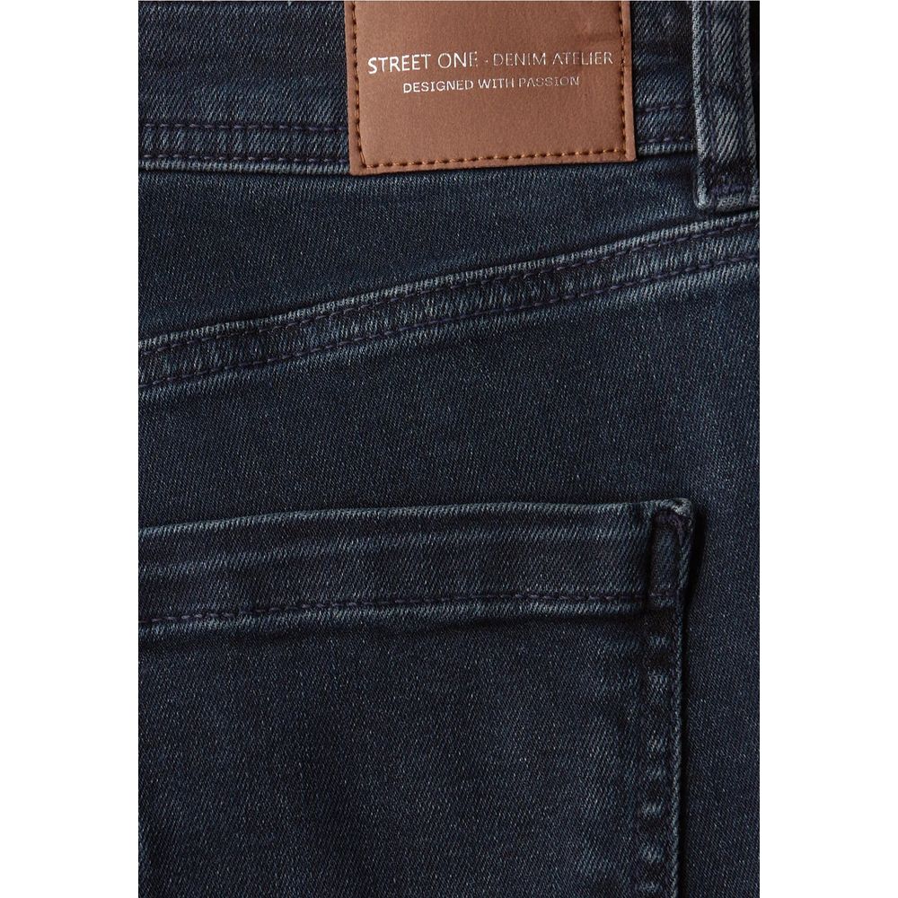 Jeans by Street One for women in stretch denim cotton blue features a polished silhouette with a polished skinny & slim, reaching a polished long and finished with a polished .