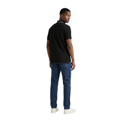 Polo Shirt by Colmar Originals for men in cotton black showcases a enviable silhouette, featuring a refined and for a enviable finish.