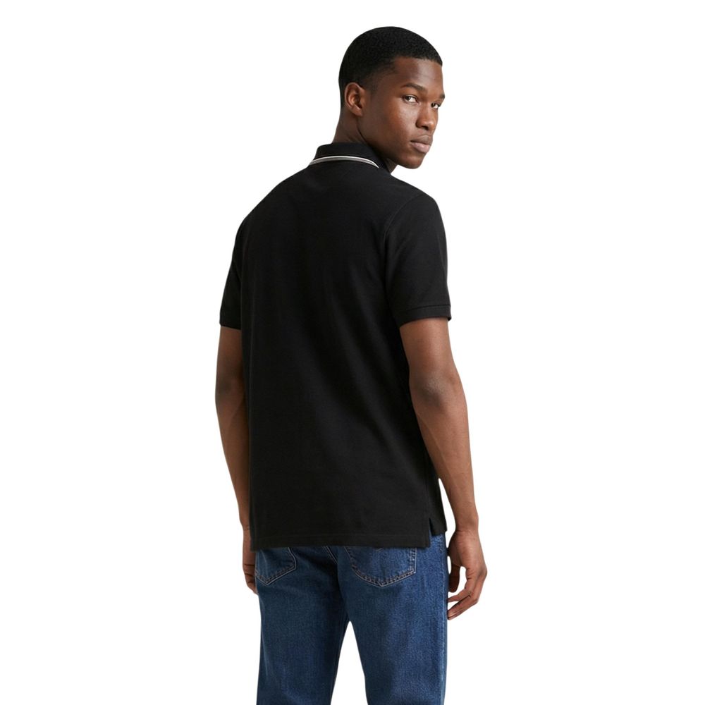 This Polo Shirt by Colmar Originals for men in cotton black presents a flawless silhouette, showcasing flawless detailing and a refined for a truly flawless aesthetic.