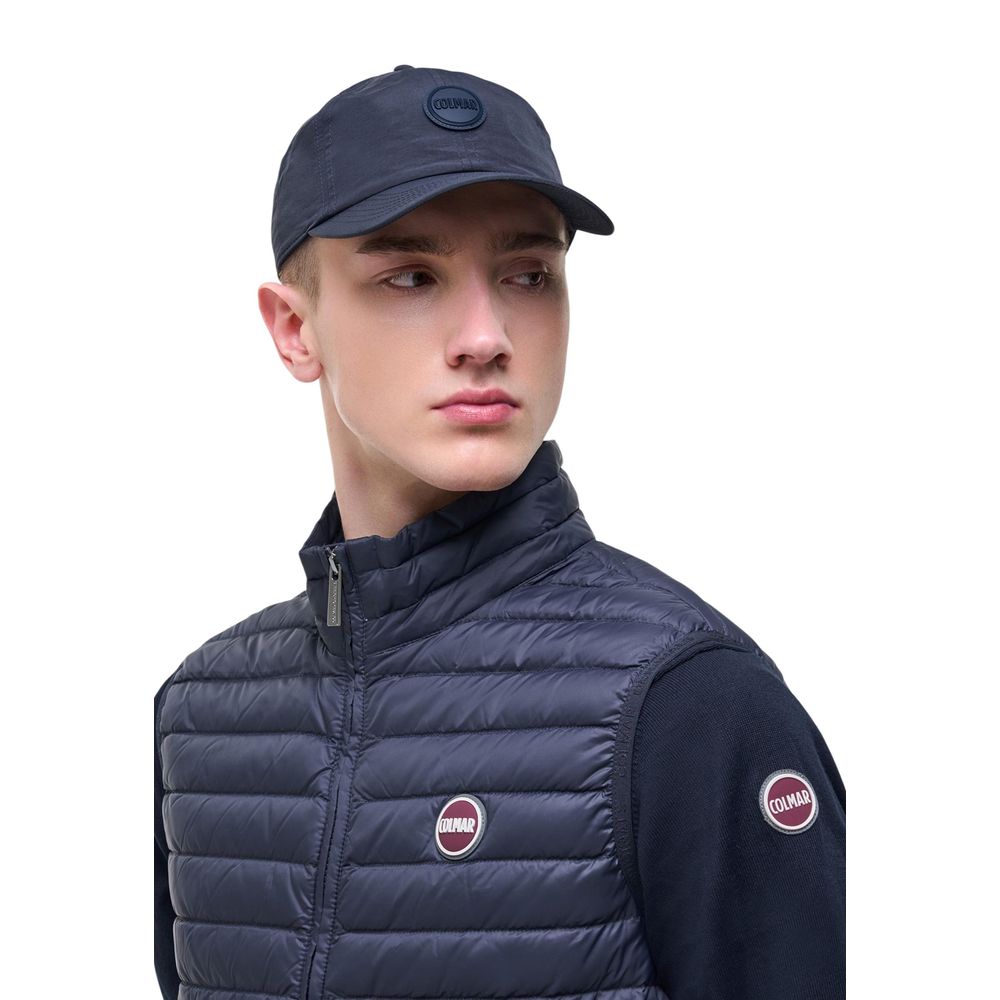 Vest by Colmar Originals for men in polyamide blue features a chic silhouette, expertly detailed with a refined and premium lightweight, pockets & insulated for a truly chic look.