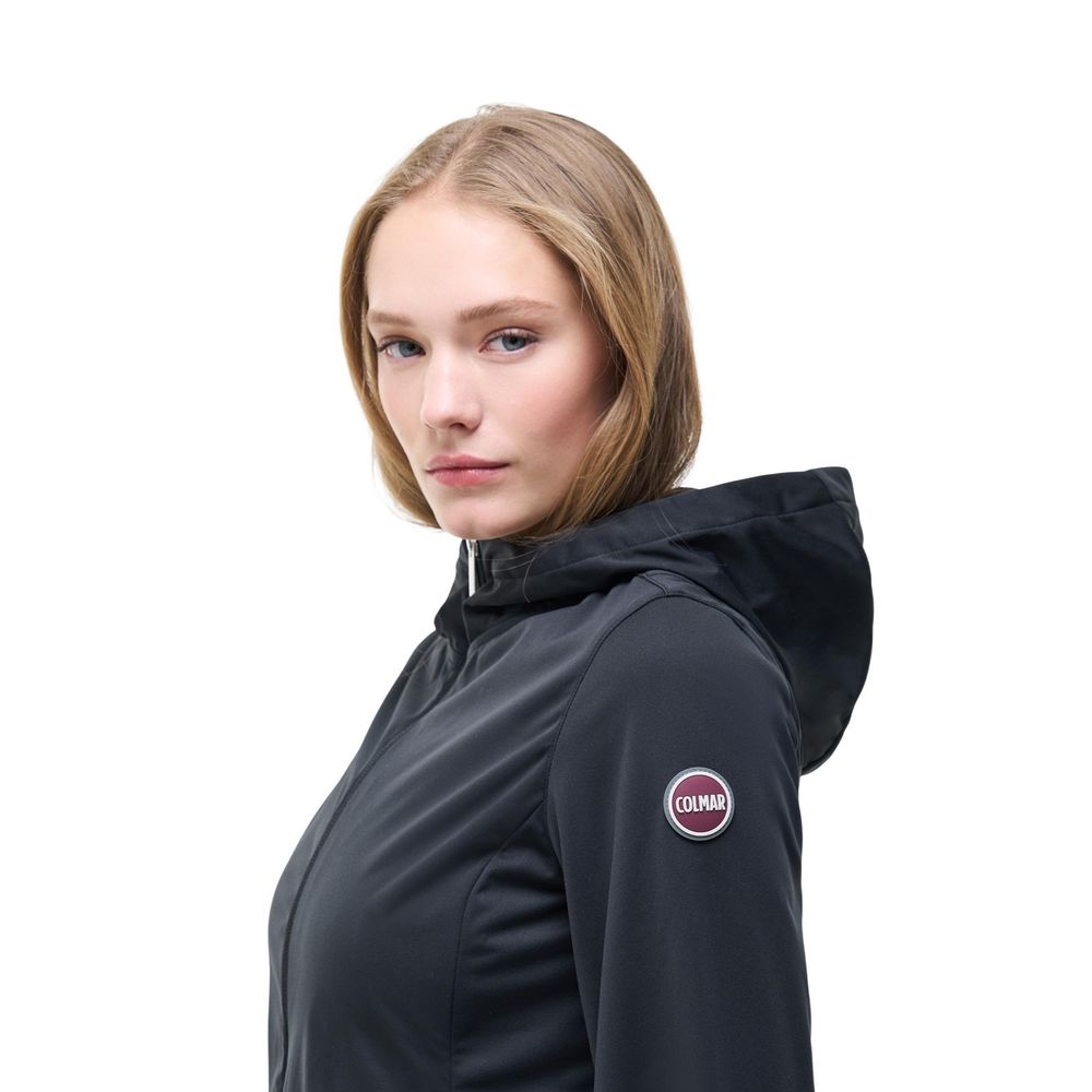 Hooded Windbreaker Jacket by Colmar Originals for women in polyester black presents a resilient silhouette, artfully detailed with a sophisticated hooded neckline and functional hooded & windproof for a resilient finish.