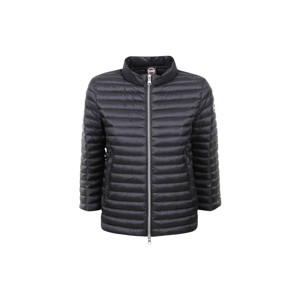Hooded Windbreaker Jacket by Colmar Originals for women in polyamide black presents a resilient silhouette, artfully detailed with a sophisticated hooded neckline and functional lightweight, pockets, hooded, insulated & windproof for a resilient finish.