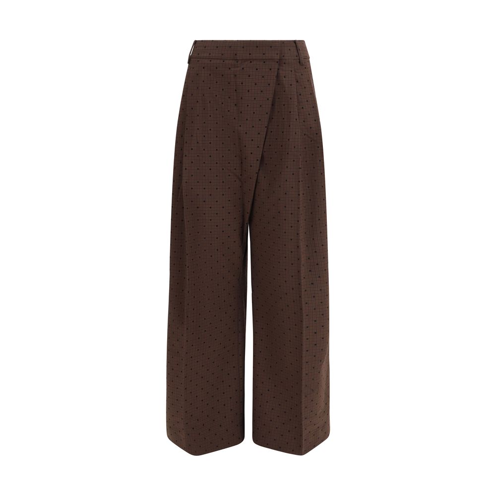 Casual Pants by Ganni for women in stretch viscose polyester brown, plaid & print features an sophisticated and regular-fit with a precise long, creating a sophisticated and sophisticated silhouette.