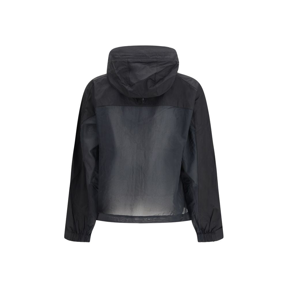 Hooded Windbreaker Jacket by Y-3 for men in cotton nylon satin black presents a resilient silhouette, artfully detailed with a sophisticated hooded high-neck neckline and functional pockets, hooded & windproof for a resilient finish.