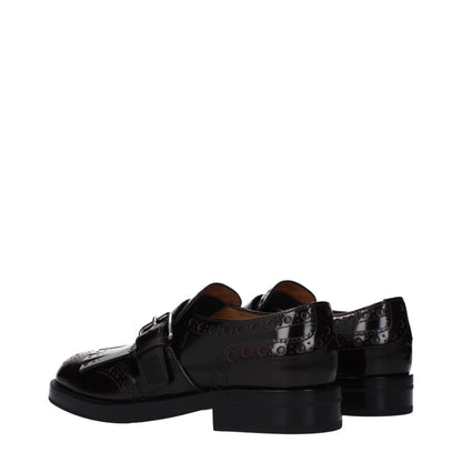 Flat Loafer Slip-On Shoes by Church's for women in leather red features an effortless chic silhouette, showcasing the Women's Leather Flat Loafer Slip-On Shoes design with an effortless chic flat and a for a effortless chic look.