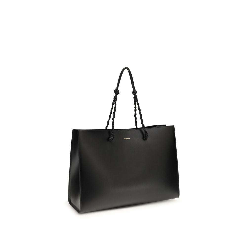 Tote Shoulder Bag by Jil Sander for women in bos taurus calf leather black & signature showcases a enviable silhouette, artfully detailed with a secure magnetic & button, organized , and versatile handle for a enviable look.