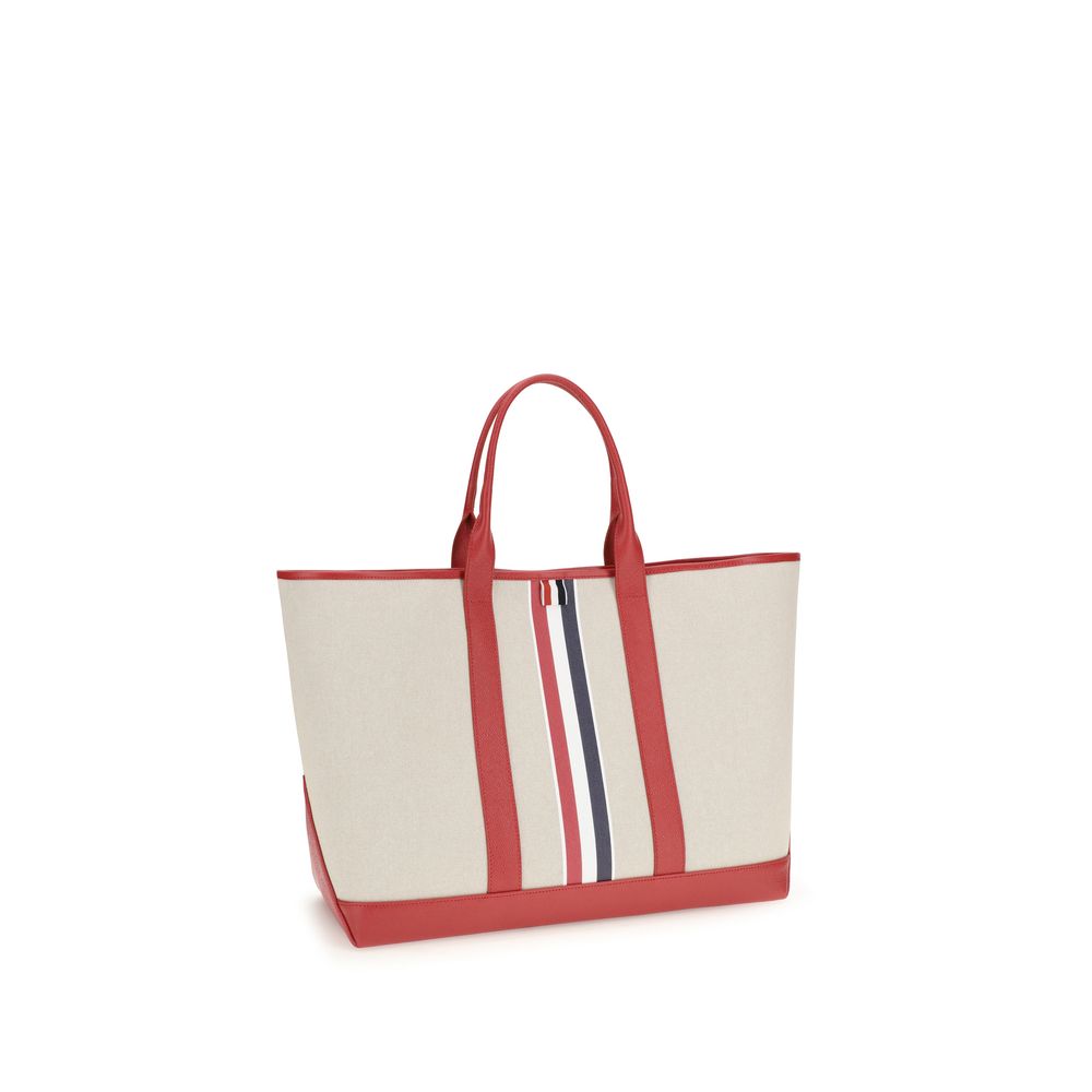 Large Tote Shoulder Bag by Thom Browne for men in cotton canvas & bos taurus calfskin leather black, multicolor, red, white, signature & striped features a enviable silhouette, showcasing a secure , ample , and enviable handle for a enviable finish.