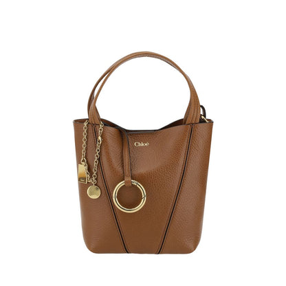 Shoulder Bag by Chloé for women in bos taurus grained leather brown, signature & monogram features a effortless chic silhouette with a secure magnetic & button, ample single-compartment, and versatile shoulder-strap, handle & adjustable-strap for a effortless chic finish.