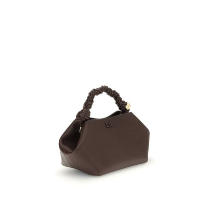 This Small Handbag by Ganni for women in polyester & polyurethane and brown presents a sculptural silhouette featuring a secure magnetic, ample , and versatile shoulder-strap, adjustable-strap & handle for a sculptural finish.