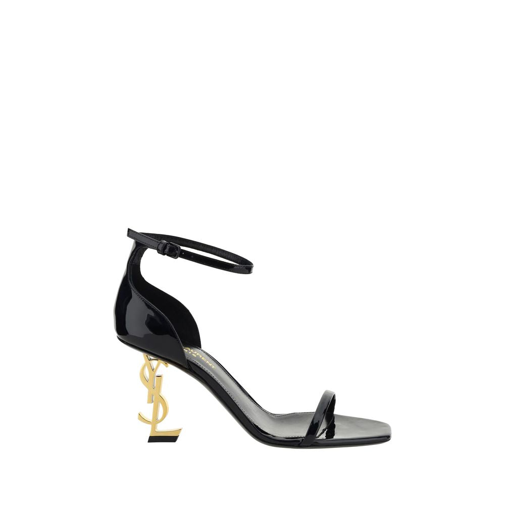 Stiletto Geometric Sandals by Saint Laurent for women in bos taurus patent calfskin leather black & gold features an statuesque Women's Bos Taurus Patent Calfskin Leather Stiletto Geometric Sandals silhouette with a refined stiletto geometric-heel and elegant square toe style.