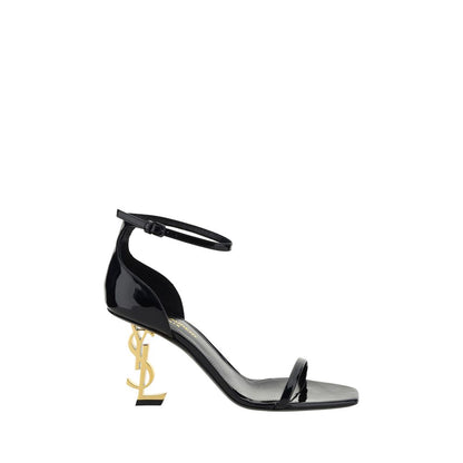 Stiletto Geometric Sandals by Saint Laurent for women in bos taurus patent calfskin leather black & gold features an statuesque Women's Bos Taurus Patent Calfskin Leather Stiletto Geometric Sandals silhouette with a refined stiletto geometric-heel and elegant square toe style.
