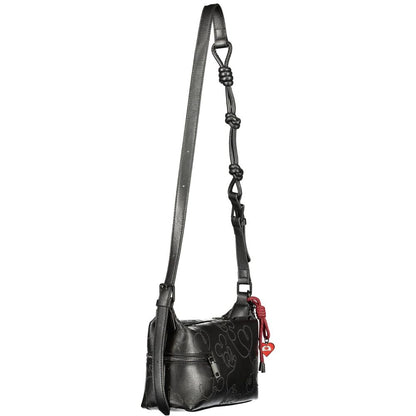 This Handbag by Desigual for women in polyurethane and black, patterned & signature presents a sculptural silhouette featuring a secure , ample , and versatile for a sculptural finish.