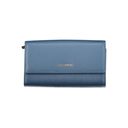 Wallet by Coccinelle for women in leather blue presents a architectural silhouette from the Leather Wallet collection, showcasing architectural for a architectural finish.