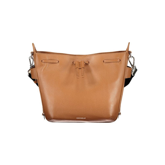 This Handbag by Coccinelle for women in leather and brown presents a sculptural silhouette featuring a secure , ample , and versatile for a sculptural finish.