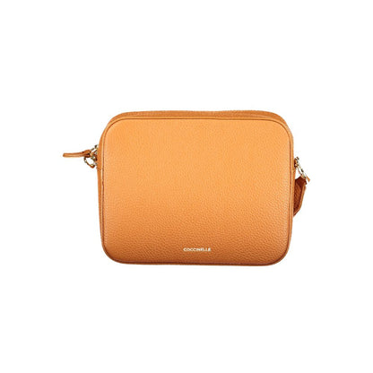 Handbag by Coccinelle for women in leather orange features a ornamental silhouette, showcasing a secure , ample , and ornamental for a sophisticated look.