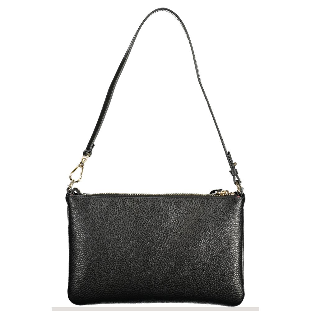 Handbag by Coccinelle for women in leather black features an refined silhouette, showcasing a secure , ample , and versatile for a sophisticated refined aesthetic.