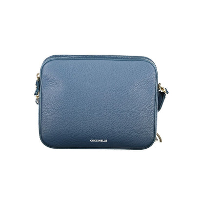 This Handbag by Coccinelle for women in leather and blue & sapphire presents a sculptural silhouette featuring a secure , ample , and versatile for a sculptural finish.