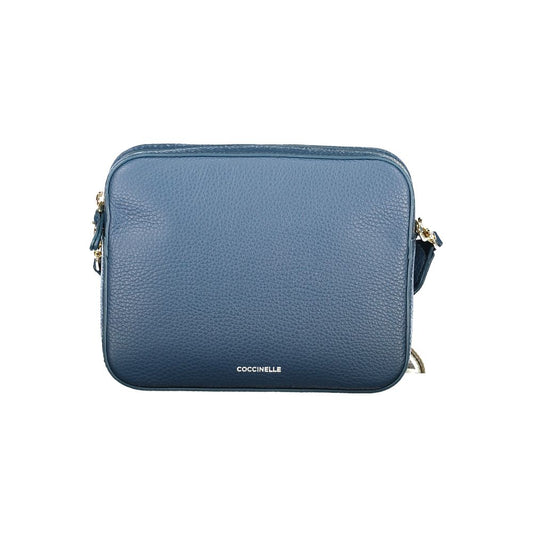 This Handbag by Coccinelle for women in leather and blue & sapphire presents a sculptural silhouette featuring a secure , ample , and versatile for a sculptural finish.
