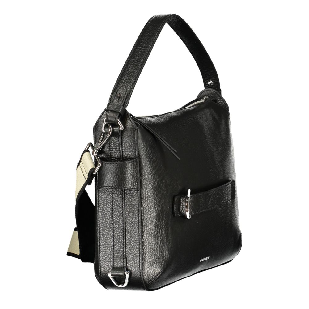 Handbag by Coccinelle for women in leather black presents a ornamental silhouette, showcasing a secure , ample , and versatile for a ornamental finish.
