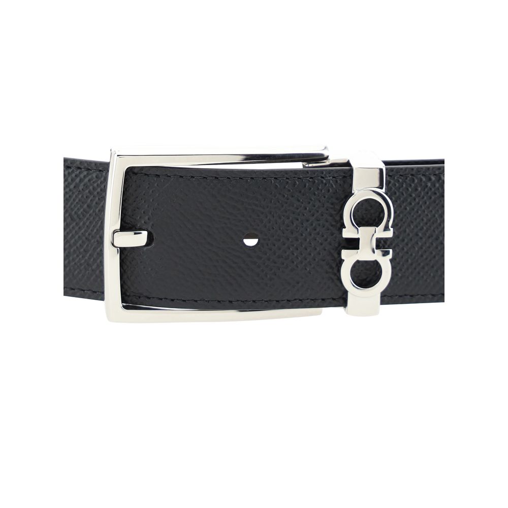 Belt by Ferragamo for men in grained bos taurus calf leather black features an artisanal finish, elegantly showcasing the signature style and artisanal craftsmanship of the Gancini Grained Bos Taurus Calf Leather Belt design.