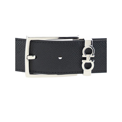 Belt by Ferragamo for men in grained bos taurus calf leather black features an artisanal finish, elegantly showcasing the signature style and artisanal craftsmanship of the Gancini Grained Bos Taurus Calf Leather Belt design.