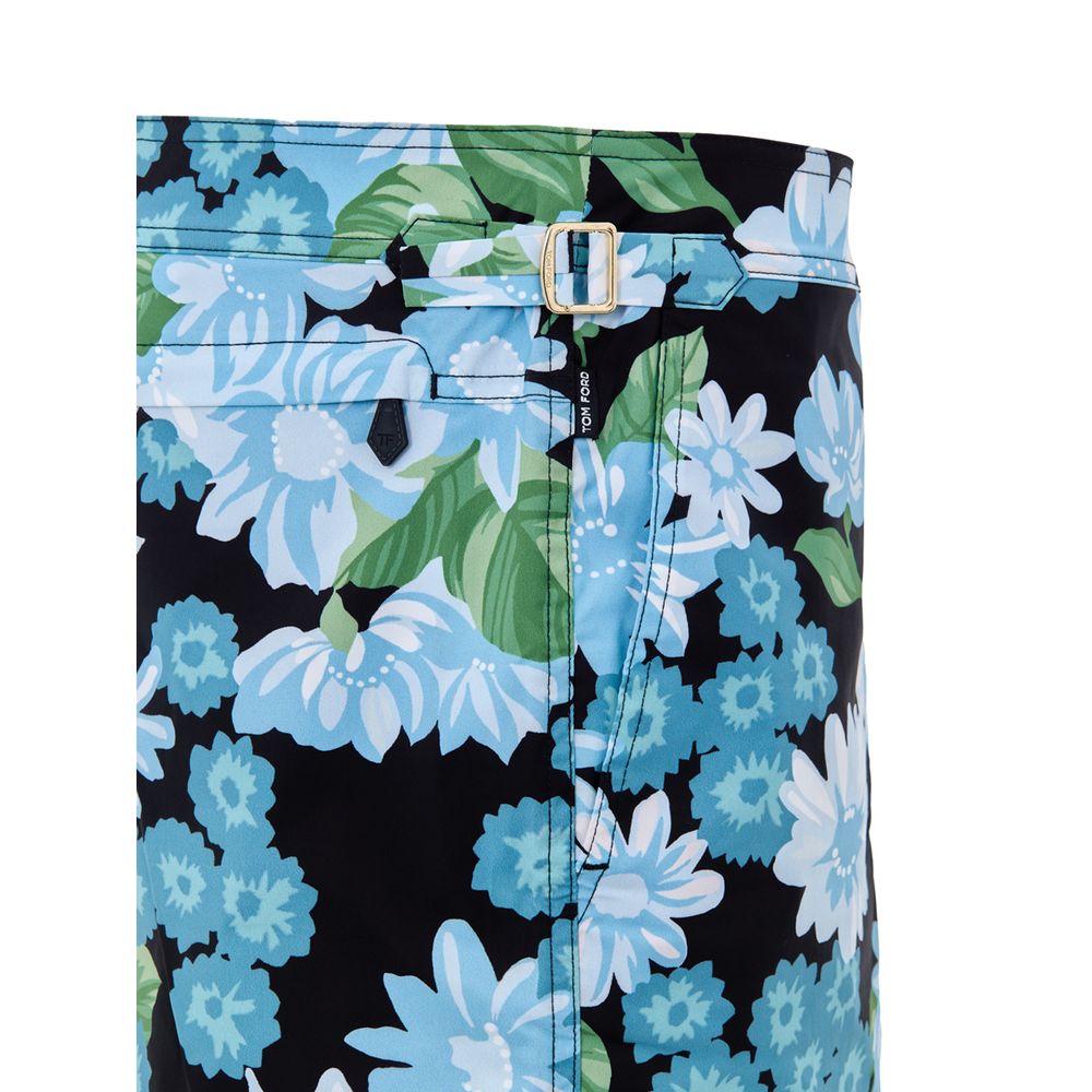 Swim Briefs by Tom Ford for men in stretch polyamide black, gold, green, light-blue, floral & print features a riviera-ready silhouette, showcasing the riviera-ready design of the Men's Stretch Polyamide Swim Briefs for a sophisticated look.