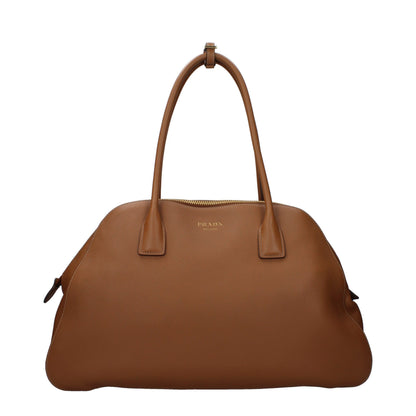 Shoulder Bag by Prada for women in leather brown features a effortless sophistication silhouette, secured by a with ample and versatile shoulder-strap for a effortless sophistication finish.