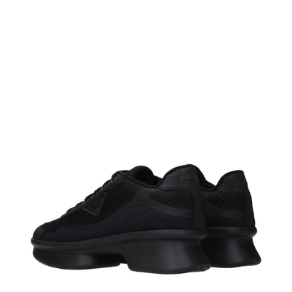 Sneakers by Prada for women in fabric black presents a sumptuous silhouette, artfully capturing the essence of the Women's Low Top Fabric Sneakers with its sumptuous low-top style design.