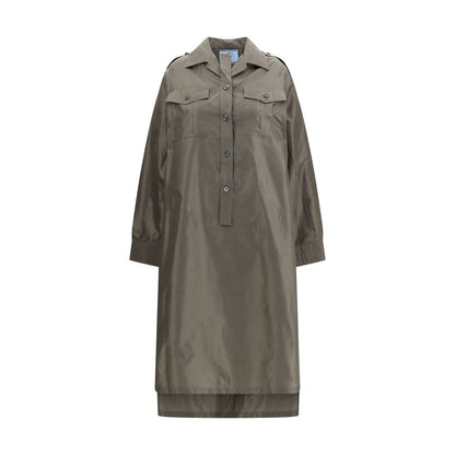 Dress by Prada for women in silk bicolour & signature features an magnificent silhouette, artfully detailed with a magnificent shirt-collar neckline and long-sleeve that flows into an magnificent long.
