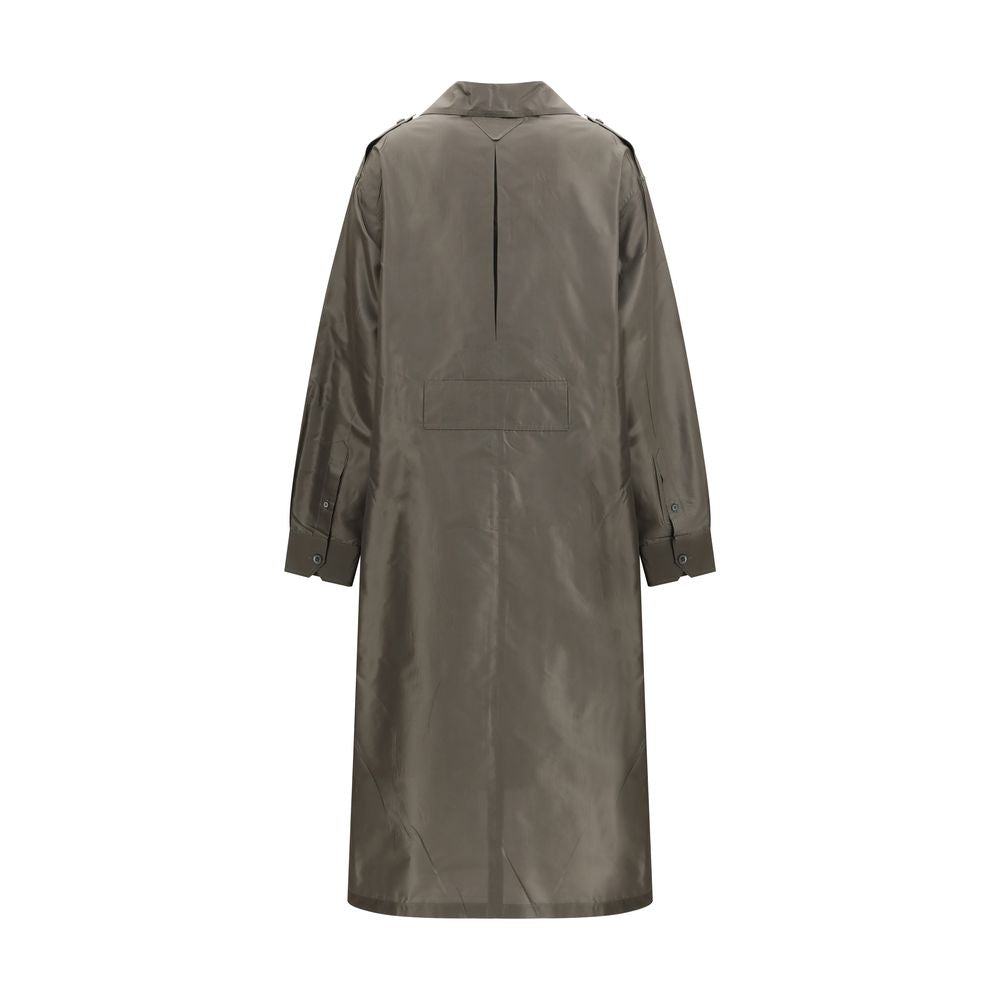 Dress by Prada for women in silk bicolour & signature showcases a striking silhouette, elegantly detailed with a , refined shirt-collar neckline, and a striking long for a striking finish.