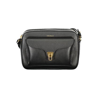 Handbag by Coccinelle for women in leather black, signature & print features a signature silhouette, showcasing a secure zipper and signature external-pockets & internal-pockets with versatile shoulder-strap & adjustable-strap for a sophisticated look.
