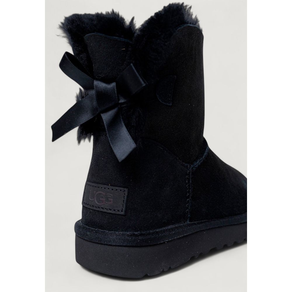 Ankle Winter Boots by UGG for women in plastic suede leather & wool black features an performance-driven Women's Lightweight Plastic Suede Leather & Wool Ankle Winter Boots silhouette, defined by a sophisticated and a performance-driven .