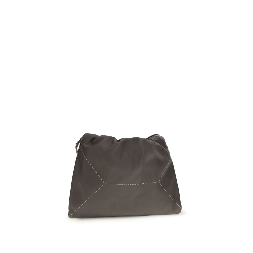 Shoulder Drawstring Bag by Brunello Cucinelli for women in bos taurus calf leather brown showcases a enviable silhouette, artfully detailed with a secure drawstring, organized , and versatile shoulder-strap for a enviable look.