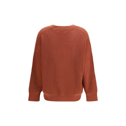 Cardigan by Brunello Cucinelli for women in cashmere & capra leather orange features an impeccable silhouette, showcasing a sophisticated v-neck neckline and detail for a truly impeccable finish.