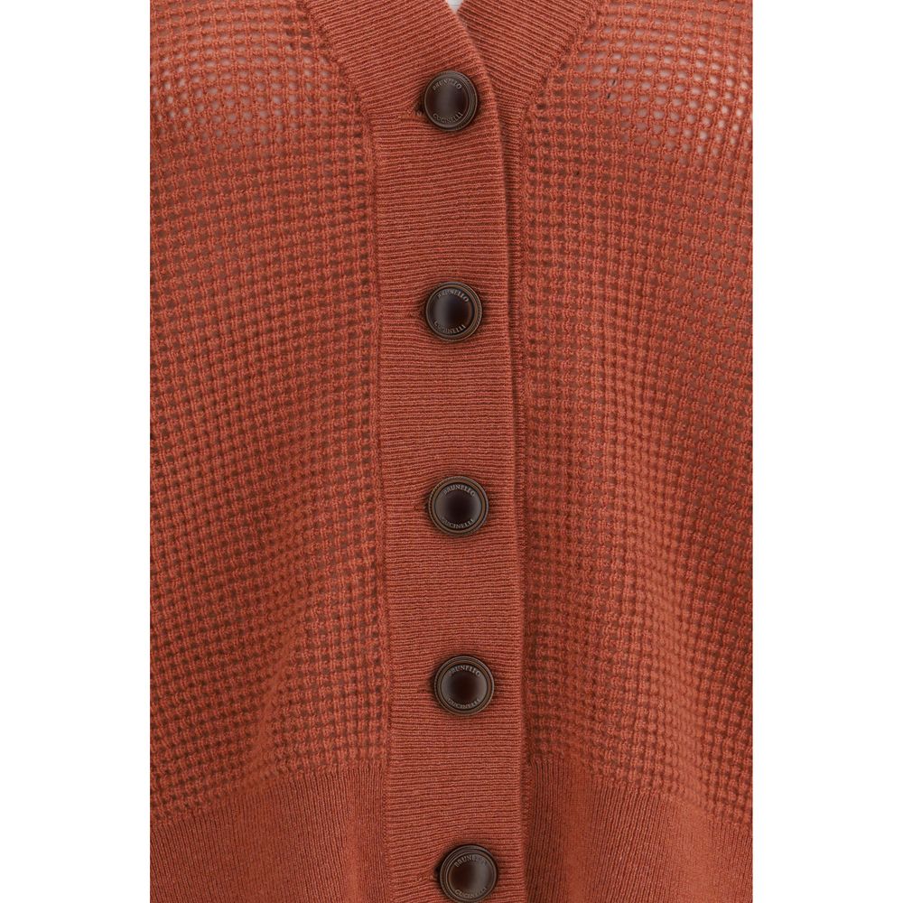 Cardigan by Brunello Cucinelli for women in cashmere & capra leather orange features a dramatic silhouette, showcasing a sophisticated and dramatic detail for a timeless, premium look.