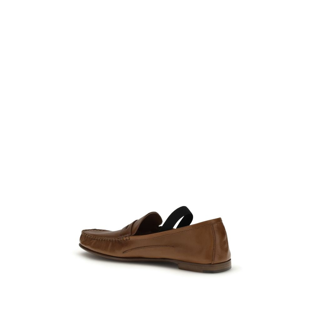 This Flat Loafer Slip-On Shoes by Versace for women in leather brown & gold features an exquisite silhouette from the Medusa Women's Leather Flat Loafer Slip-On Shoes collection, defined by a sophisticated flat and elegant .