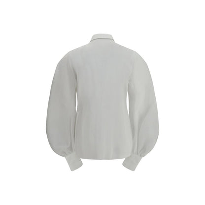 Blouse by Brunello Cucinelli for women in cotton white showcases a sleek silhouette, elegantly detailed with a sleek and for a sleek finish.