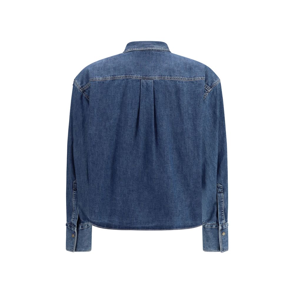 Shirt by Brunello Cucinelli for women in denim cotton blue presents a discerning silhouette, showcasing a sophisticated and for a truly discerning finish.