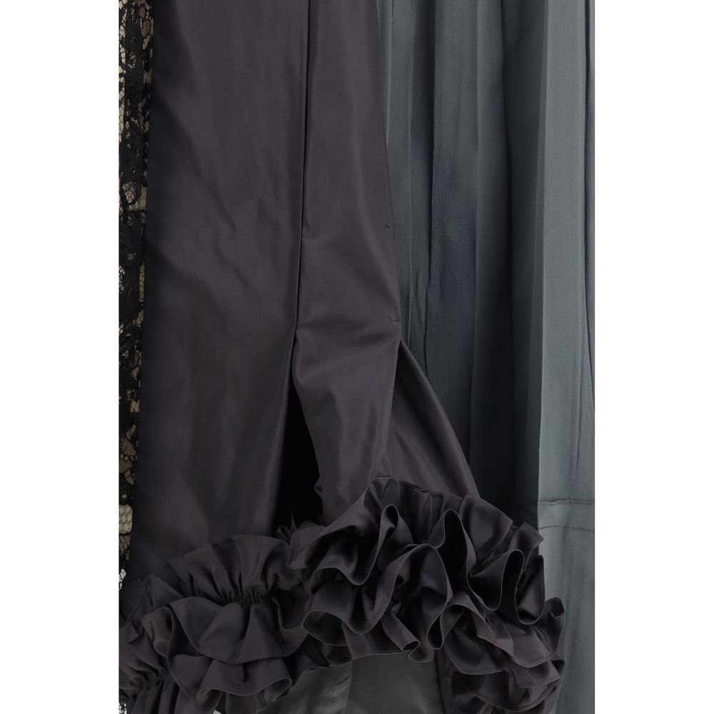 Skirt by Prada for women in silk multicolor & patchwork showcases a dramatic silhouette, artfully capturing the essence of the Women's Silk Midi Skirt in a dramatic midi cut for a refined look.