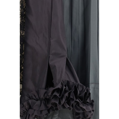 Skirt by Prada for women in silk multicolor & patchwork showcases a dramatic silhouette, artfully capturing the essence of the Women's Silk Midi Skirt in a dramatic midi cut for a refined look.
