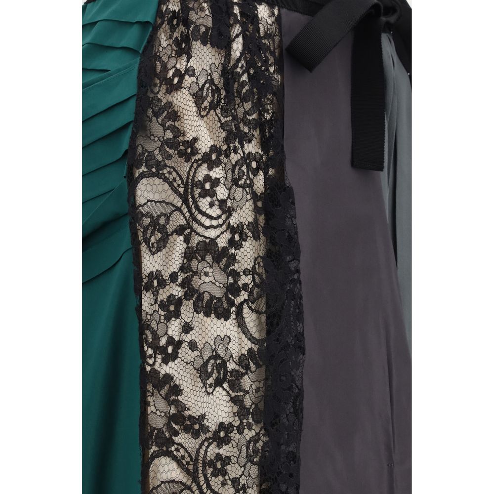 Skirt by Prada for women in silk multicolor & patchwork features an tailored silhouette, artfully capturing the essence of Women's Silk Midi Skirt in a sophisticated midi.