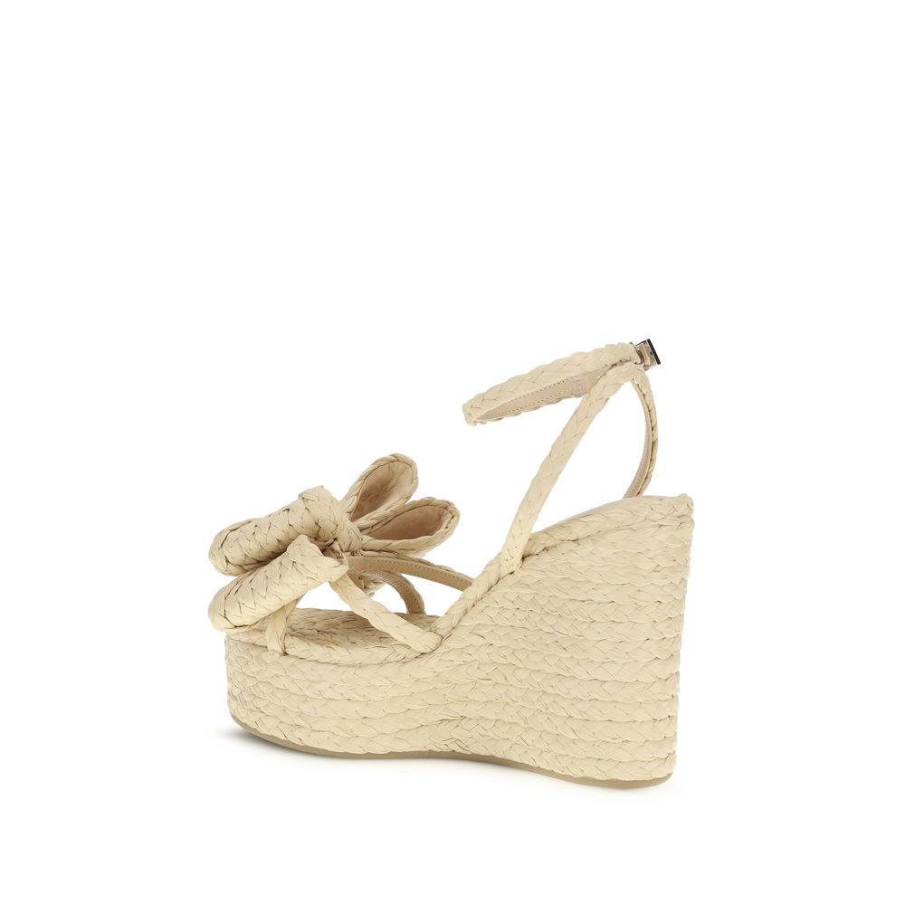 Wedge Sandals by MACH & MACH for women in raffia beige features an effortlessly chic silhouette from the Women's Raffia Wedge Sandals collection, showcasing a effortlessly chic wedge and elegant .