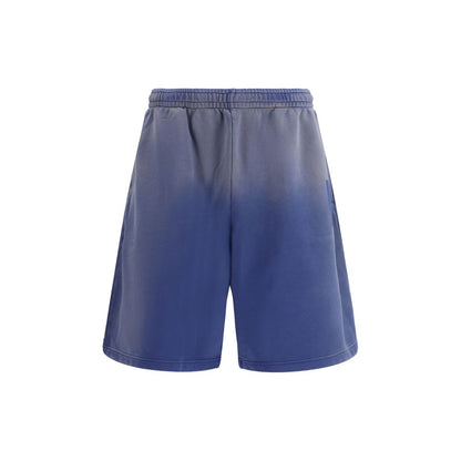 Cargo Shorts by Moschino for men in cotton gradient, blue & signature features an tailored silhouette, perfectly showcased in a tailored relaxed-fit & regular-fit with a refined short and a sophisticated .