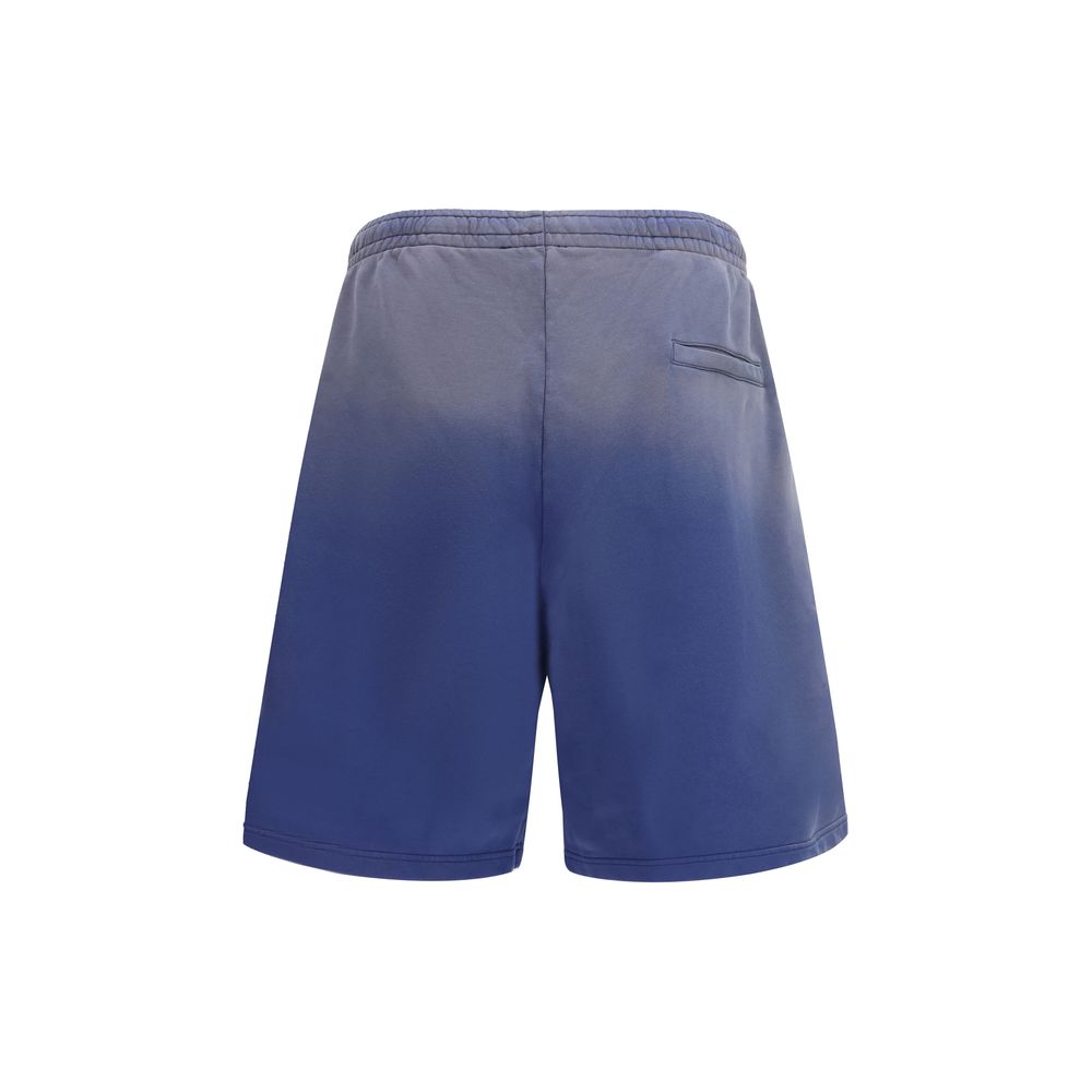 Cargo Shorts by Moschino for men in cotton gradient, blue & signature features a utilitarian chic silhouette, meticulously detailed with a utilitarian chic relaxed-fit & regular-fit, short, and for a premium, utilitarian look.