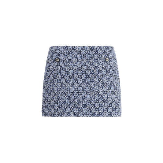 Skirt by Gucci for women in cotton velvet tweed & wool blue features a captivating silhouette, showcasing the captivating Gg Women's Cotton Velvet Tweed & Wool Mini Skirt design with a sophisticated mini for a captivating look.