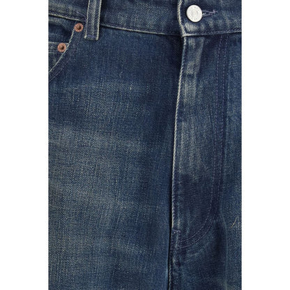 Jeans by MM6 for men in denim cotton blue presents a refined pantology silhouette, artfully defined by a refined pantology relaxed-fit & oversized, long, and a sophisticated .