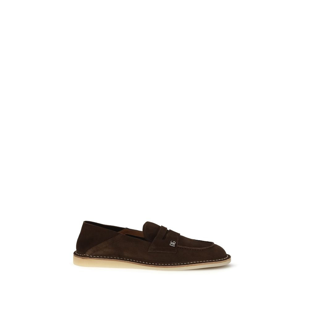 Loafer Slip-On Shoes by Dolce & Gabbana for men in bos taurus calf suede leather brown & natural showcases a impeccable silhouette as Men's Bos Taurus Calf Suede Leather Loafer Slip-On Shoes, artfully designed with a impeccable and refined for a impeccable finish.