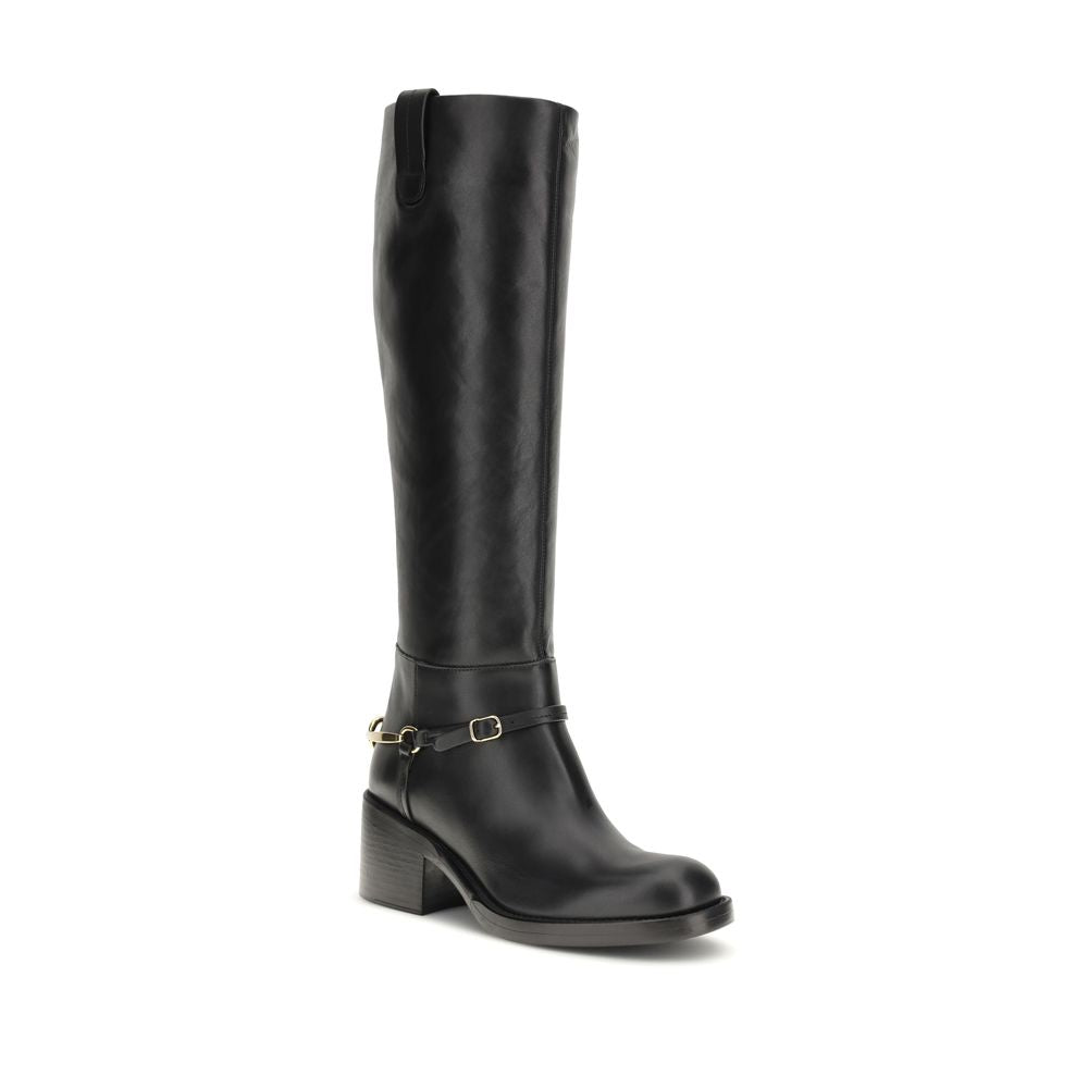 Lace-Up Riding Strap Boots by Chloé for women in bos taurus calfskin leather black & gold features an effortless chic silhouette from the Women's Bos Taurus Calfskin Leather Lace-Up Riding Strap Boots collection, showcasing a effortless chic and refined for an effortless chic look.