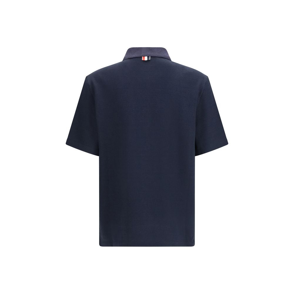 Polo Shirt by Thom Browne for men in cotton linen & polyamide blue, signature & striped features a eye catching silhouette, showcasing a refined and for a eye catching finish.
