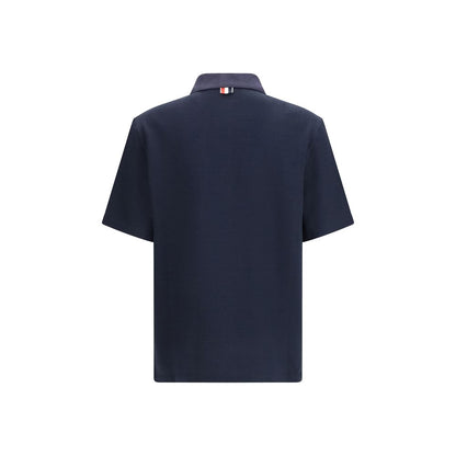 Polo Shirt by Thom Browne for men in cotton linen & polyamide blue, signature & striped features a eye catching silhouette, showcasing a refined and for a eye catching finish.